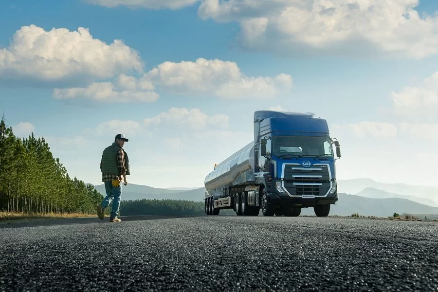 man walking towards his truck