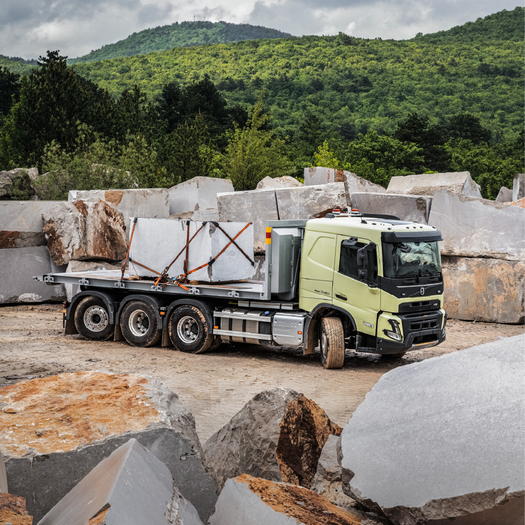 volvo fmx carrying big rock