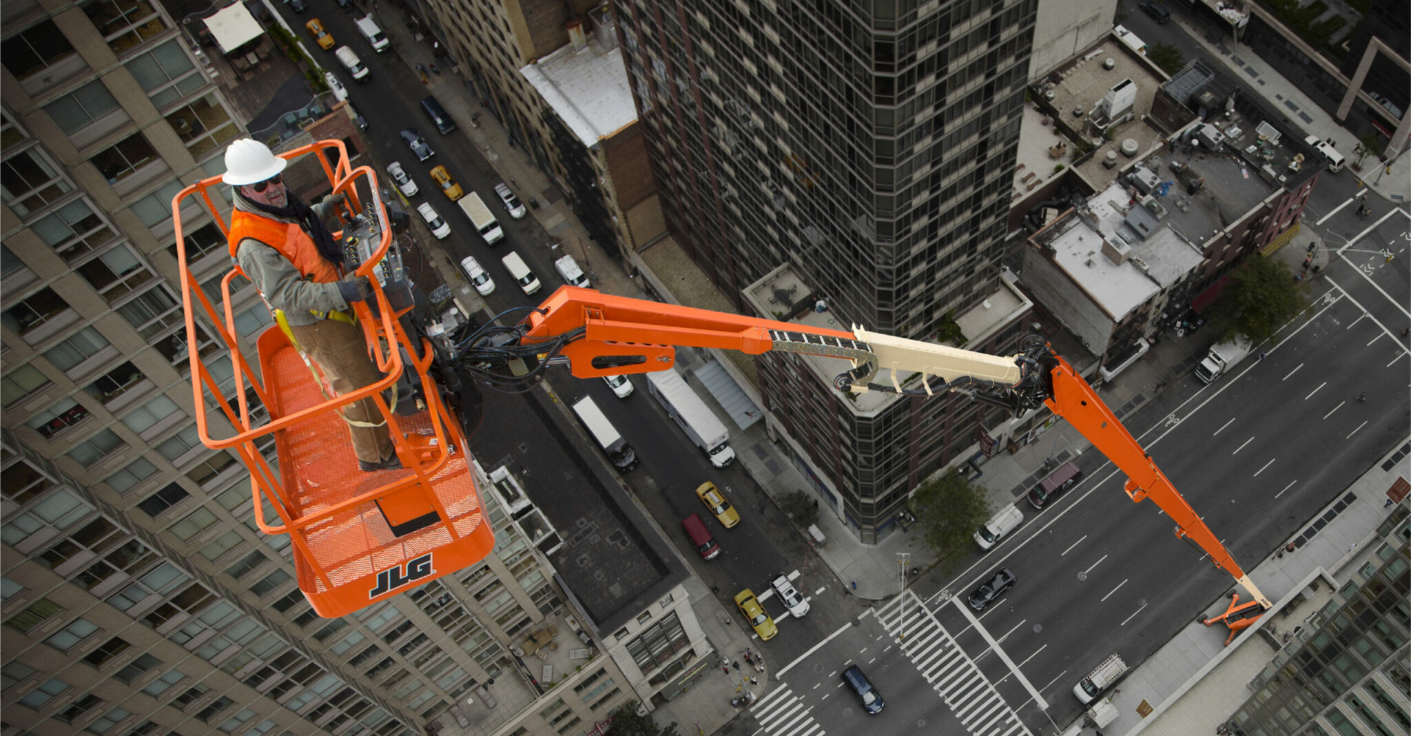 JLG telescopic boom lift 1850SJ in city scaled