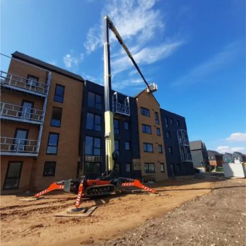 jlg compact crawler boom lift working at the roof