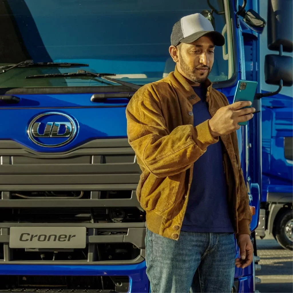 ud croner driver is infront of the truck