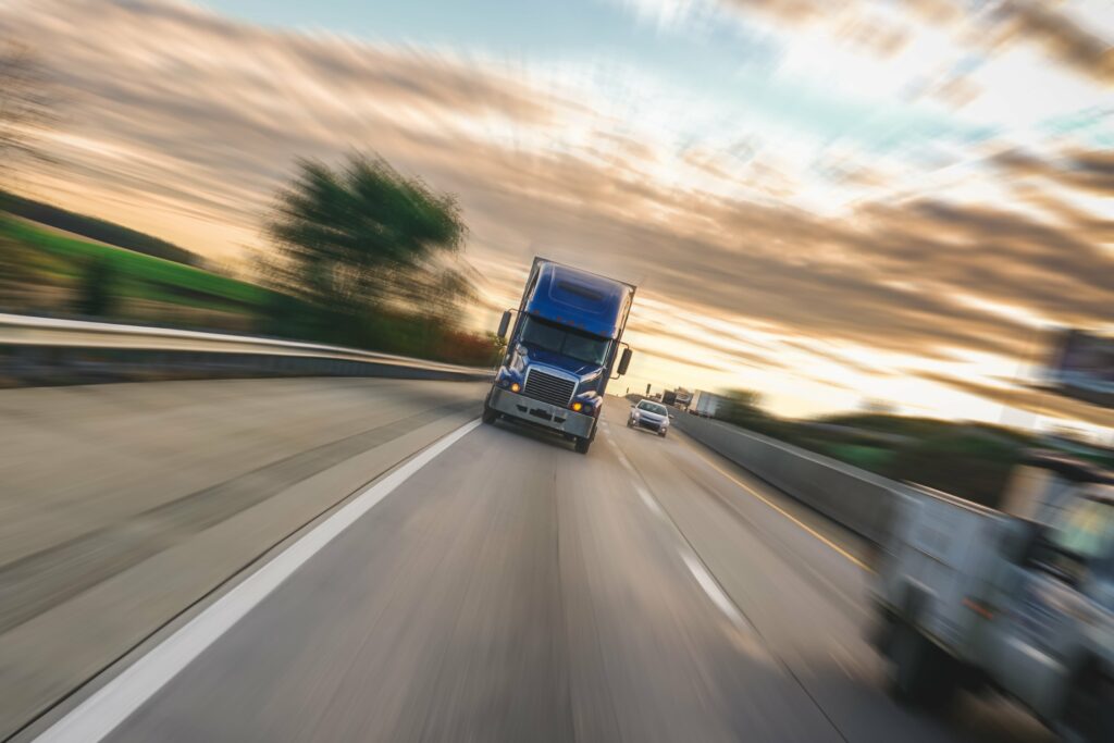 a truck moving in a highway