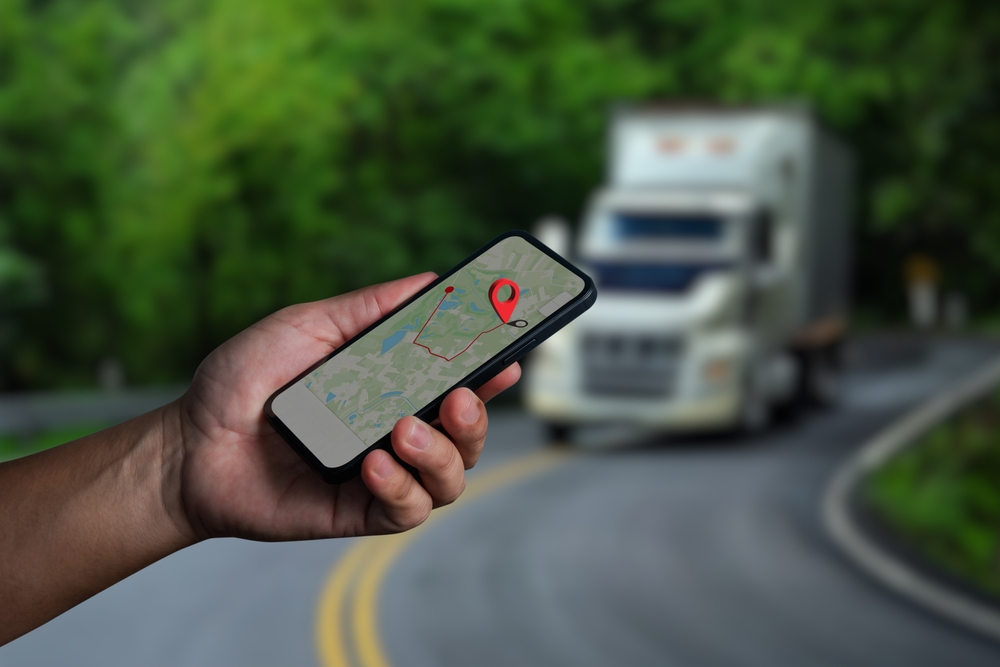 a man using his phone for gps